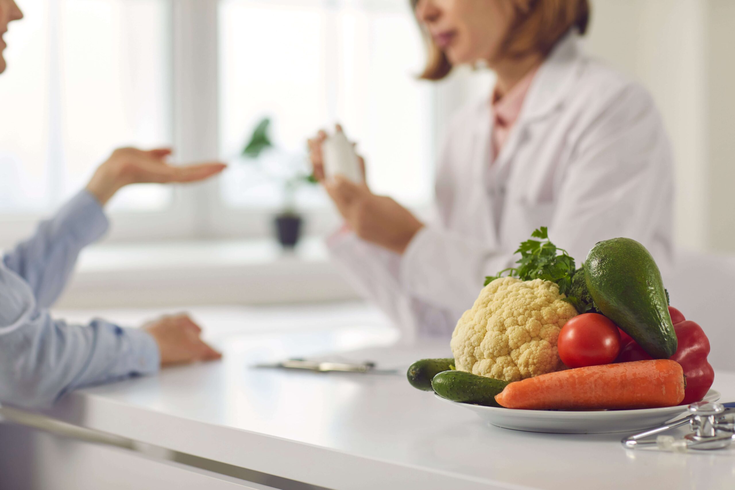 doctor educating patient on managing diabetes