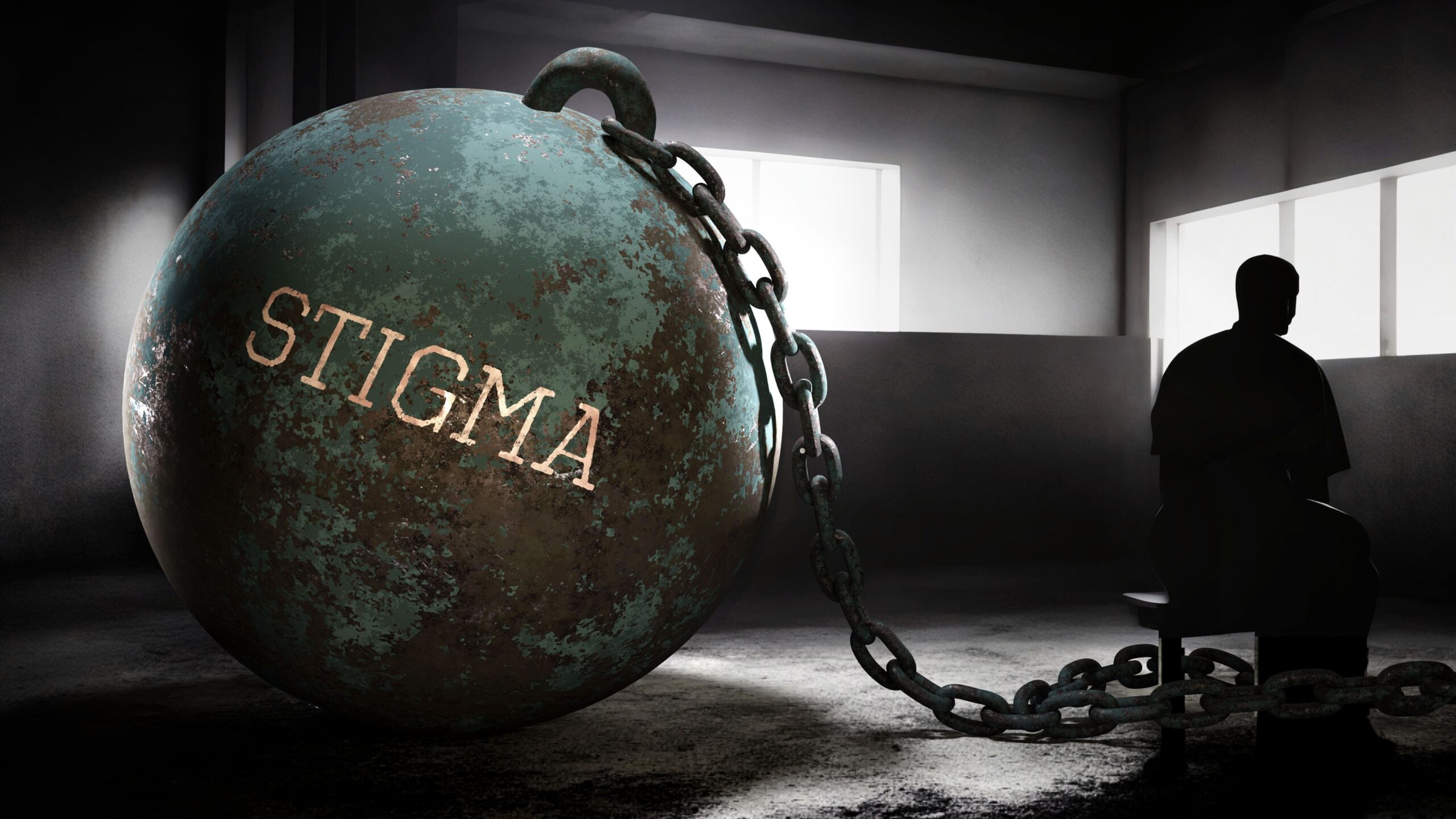 man attached to a chain that says stigma